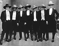 Cowboys in Cowboy Hats and Tuxedos from the Cowboys and Hatters Exhibit